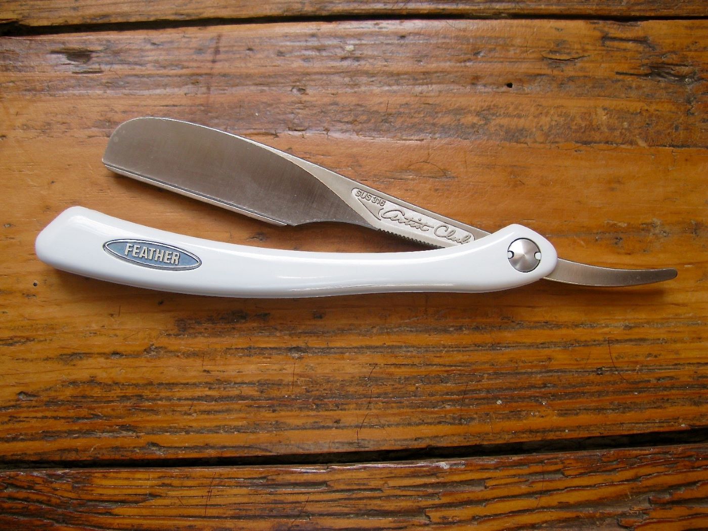 rasoir coupe-chou pour le barbier